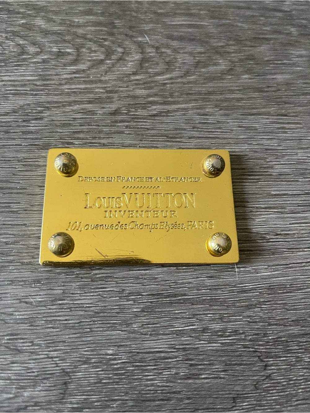 Louis Vuitton Gold Metal Logo Plate